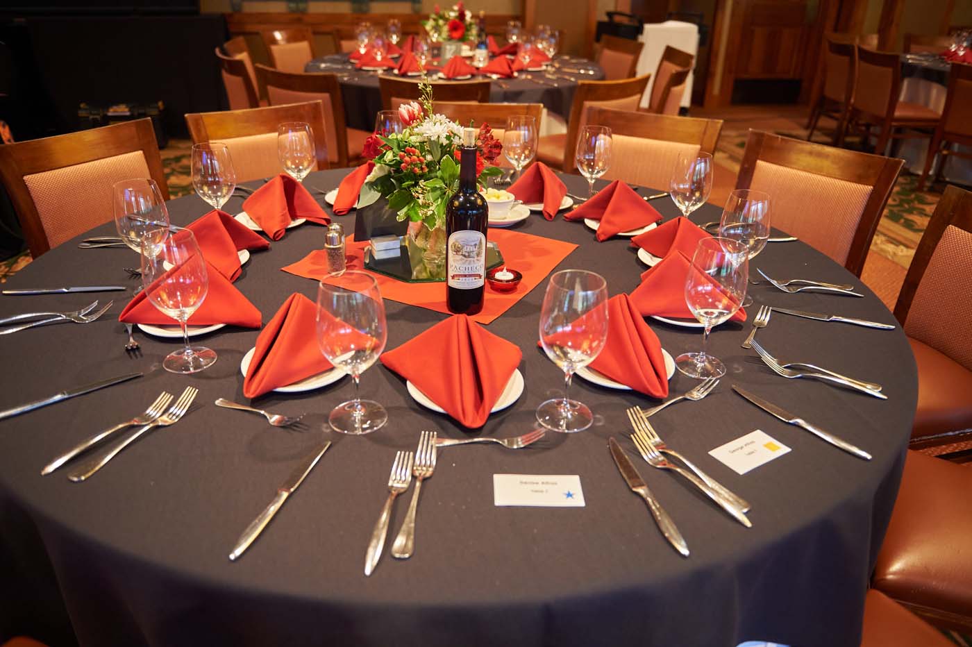 a circular table set for a large group
