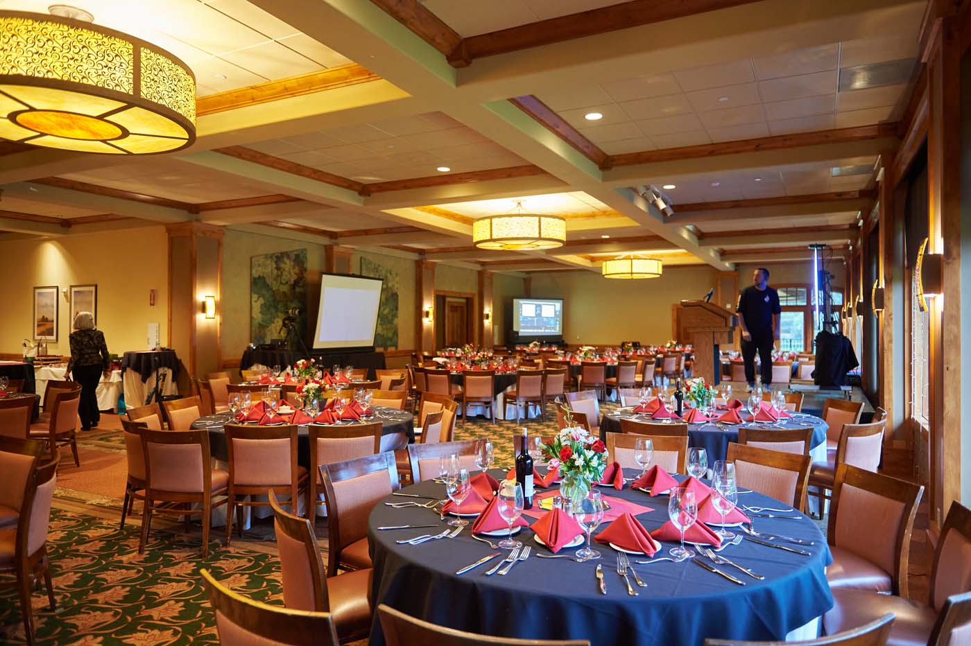 an event room with circular tables set for large groups