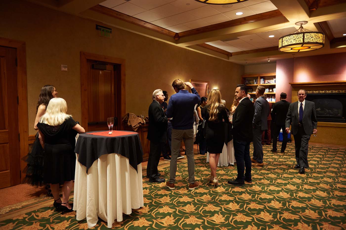 an event space filled with people standing and talking
